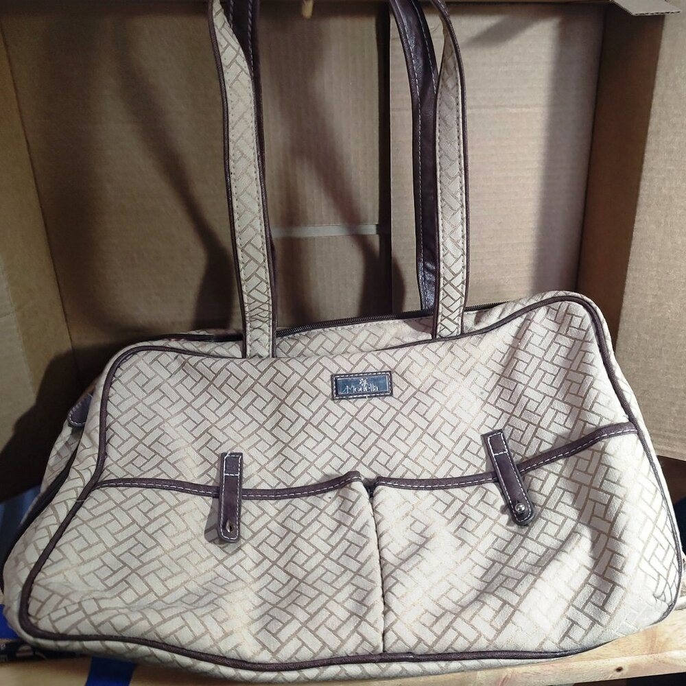 Modella tan travel bag. Many compartments.